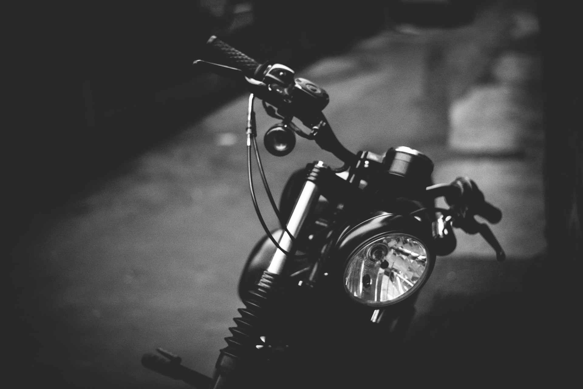 Close-Up Of Motorcycle Parked On Road